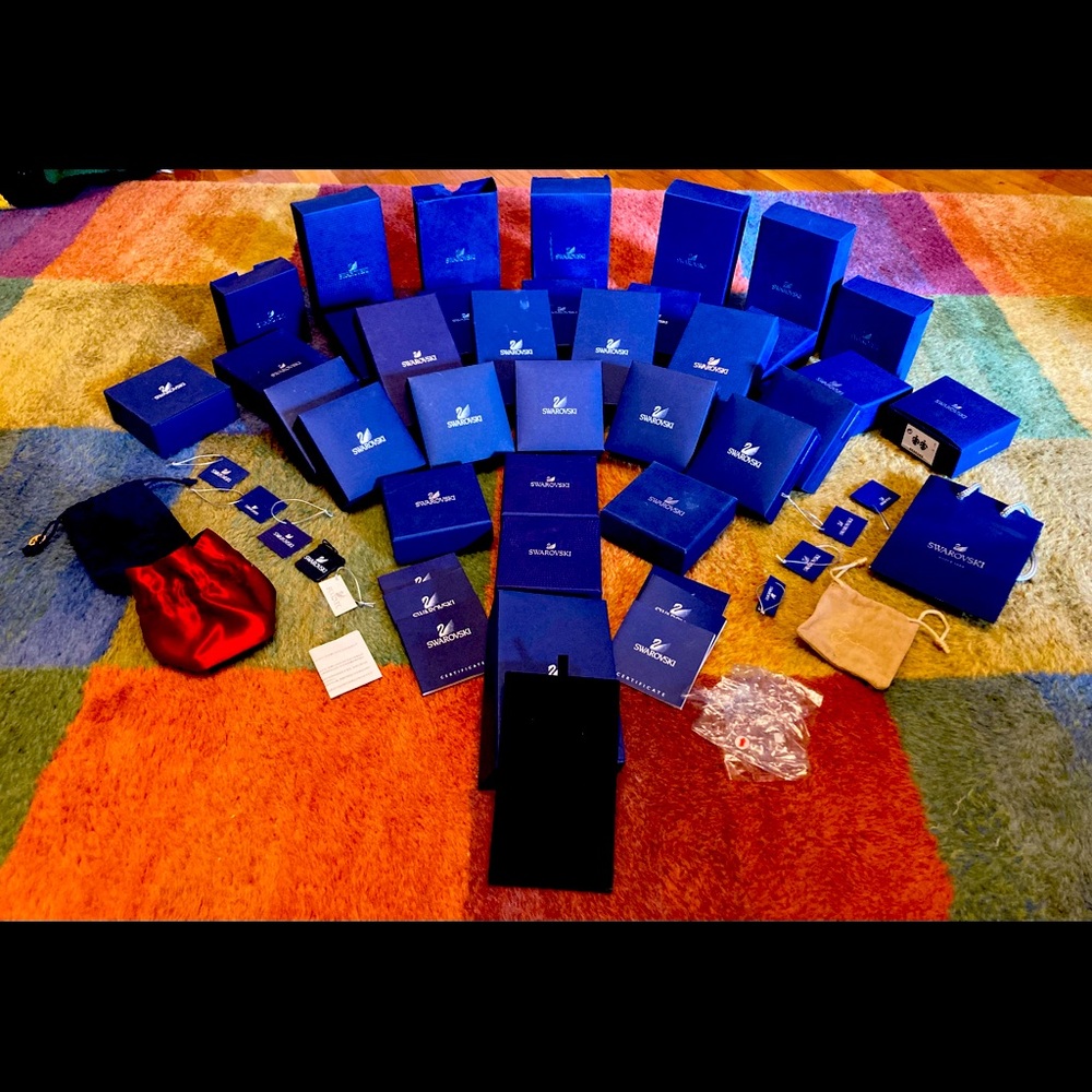Huge lot 54 pieces of Swarovski boxes, bags, certificates, sleeves, etc